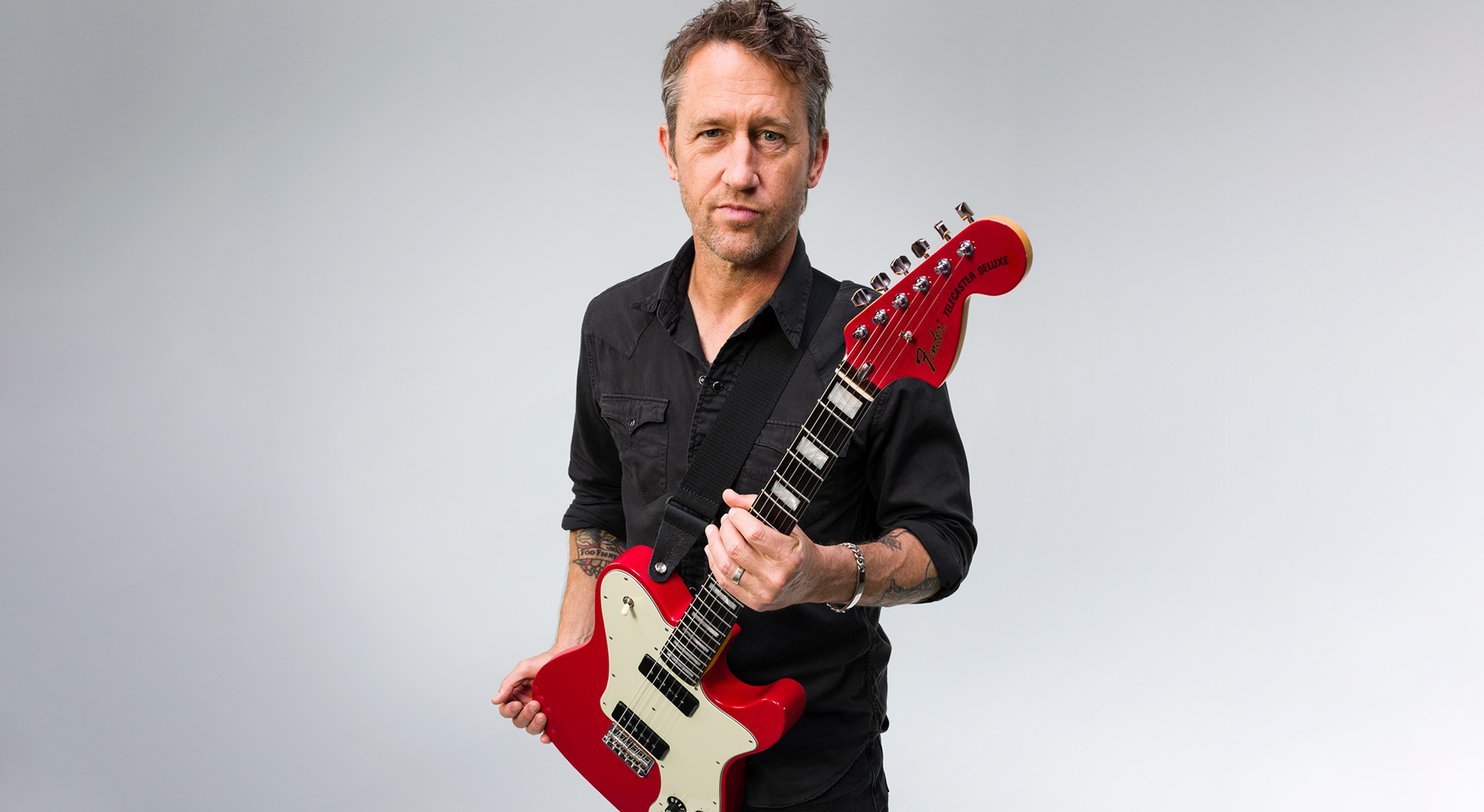 Chris Shiflett with his signature Fender Cleaver Telecaster Deluxe in Dakota Red