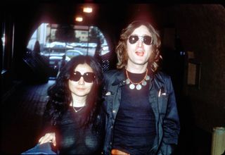 John Lennon (left) and Yoko Ono, pictured on the street in New York City in 1979