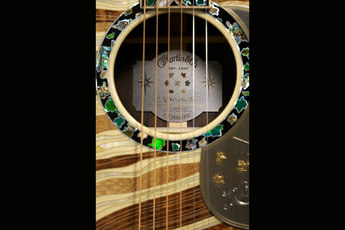 Images of Martin Guitar's 3 Millionth model, celebrating the company's 3 millionth guitar. This guitar is limited to three exampes (only one for sale) and is debuting at the 2025 NAMM Show