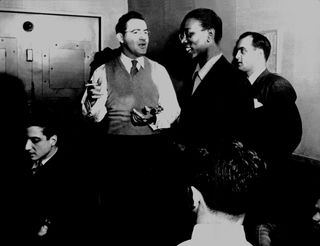 Benny Goodman with (left) Teddy Wilson and (right) Charlie Christian 1939.