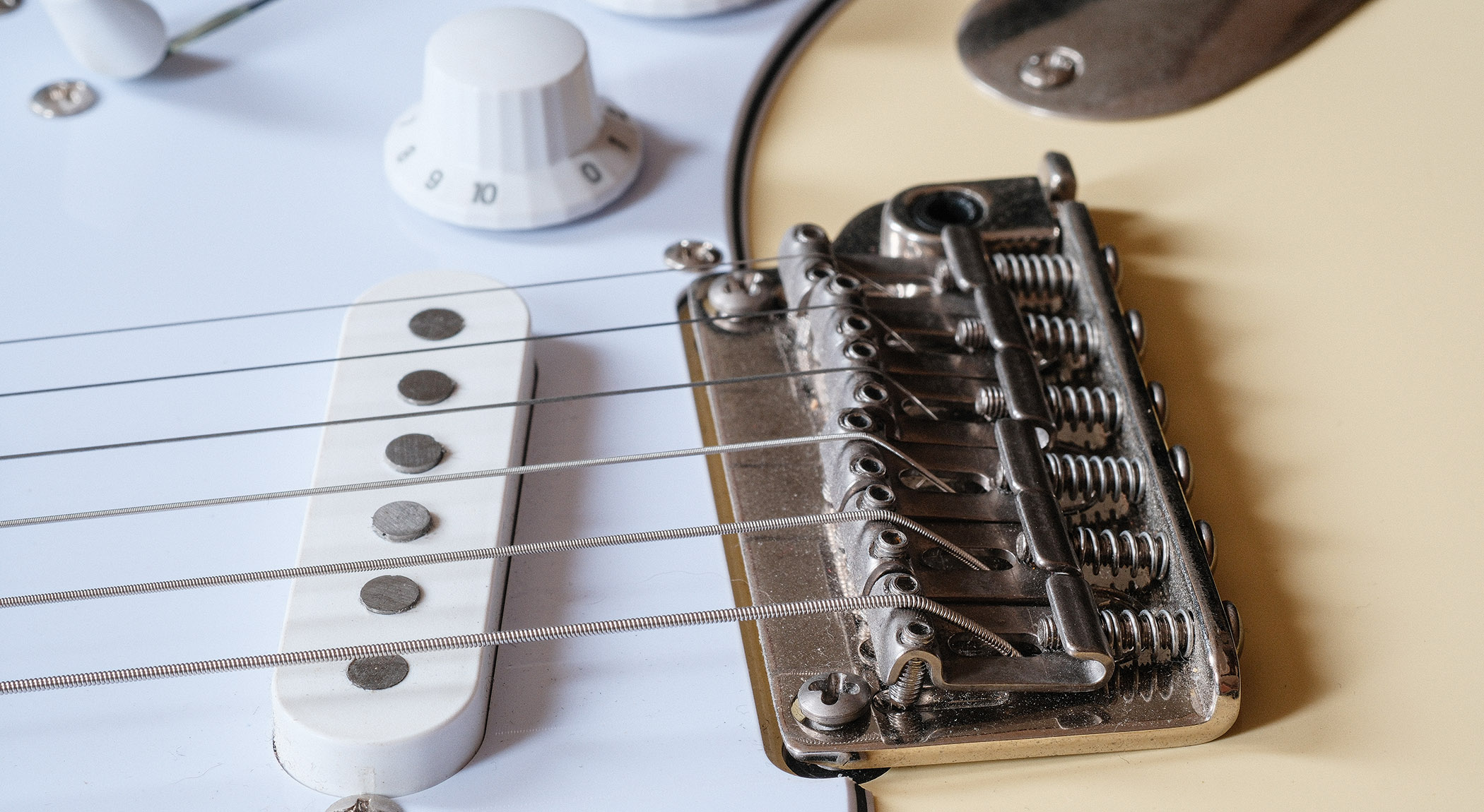 Fixes to make if your new guitar doesn't sound right: from tuners to tremolo units, nuts and string trees, many new guitars need some TLC to make them sound at their best.