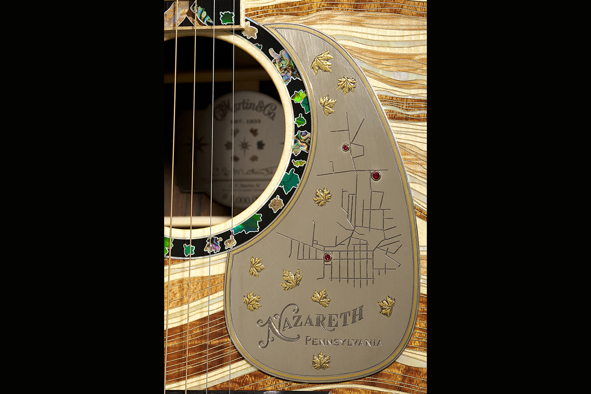 Images of Martin Guitar's 3 Millionth model, celebrating the company's 3 millionth guitar. This guitar is limited to three exampes (only one for sale) and is debuting at the 2025 NAMM Show