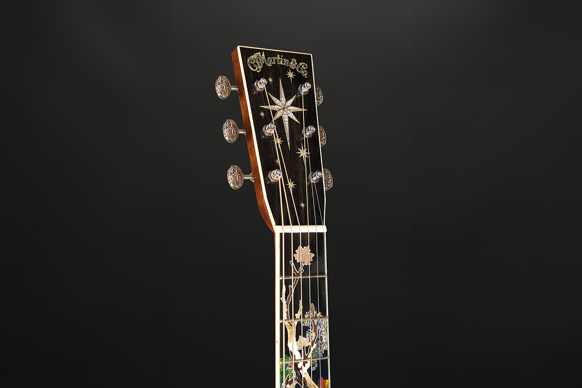 Images of Martin Guitar's 3 Millionth model, celebrating the company's 3 millionth guitar. This guitar is limited to three exampes (only one for sale) and is debuting at the 2025 NAMM Show