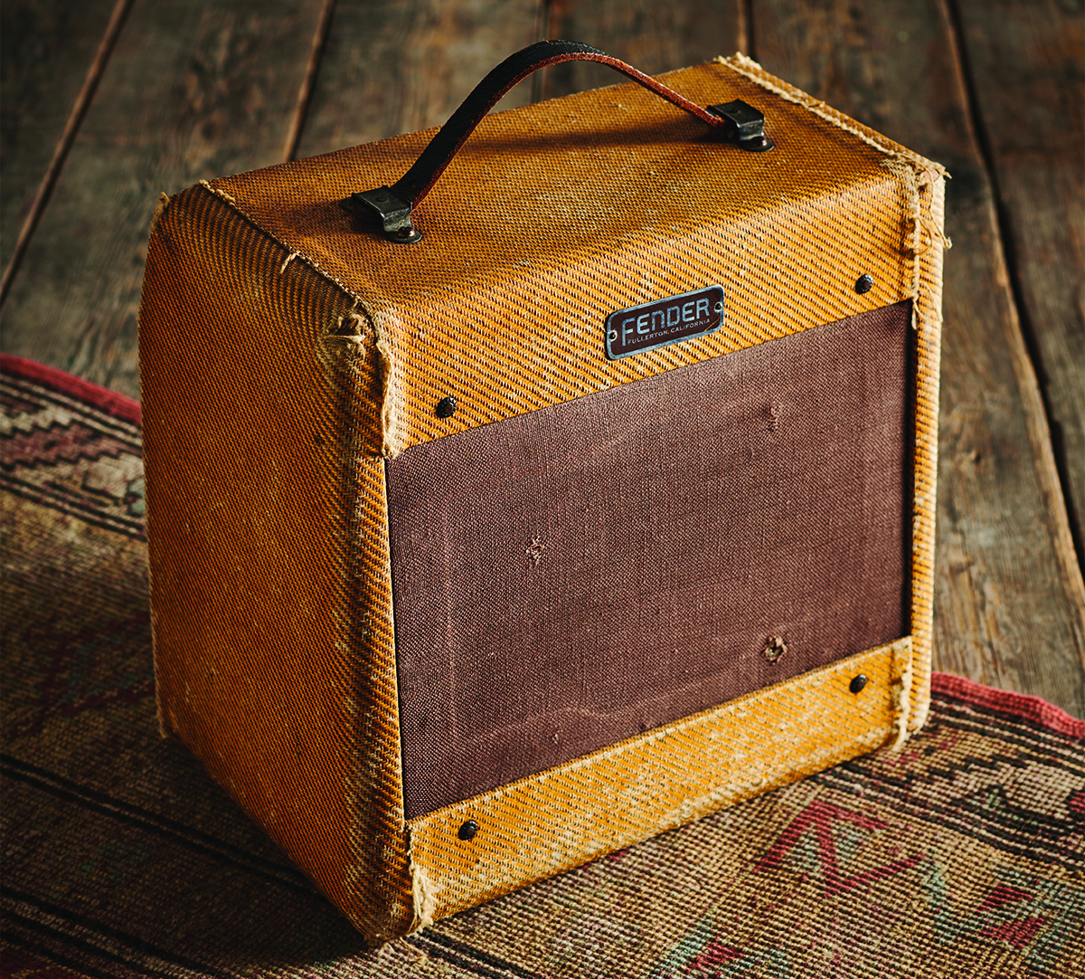 A photo of a vintage 1950s tweed Fender Champ. This is the so-called 