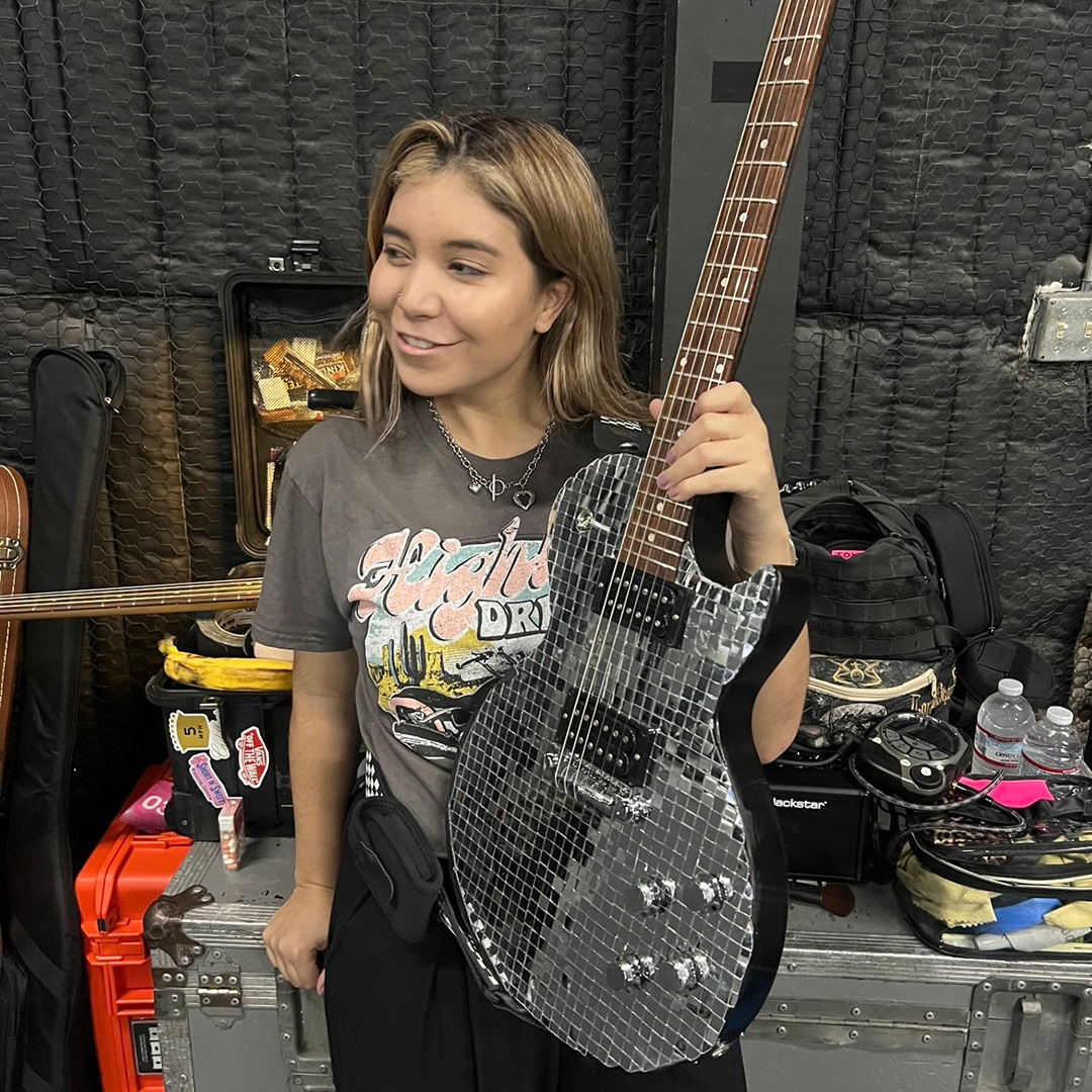 Andrea Ferrero holding a Custom Gibson LP