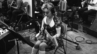 Carol Kaye playing bass guitar in a Los Angeles recording studio, early 1960's