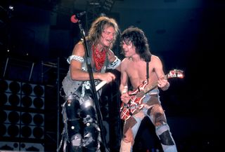 David Lee Roth (left) and Eddie Van Halen perform onstage at the Jacksonville Coliseum in Jacksonville, Florida on January 18, 1984