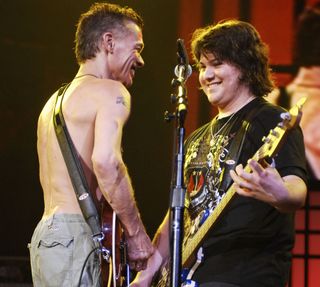 Eddie (left) and Wolfgang Van Halen perform onstage at Bobcats Arena in Charlotte, North Carolina on September 27, 2007