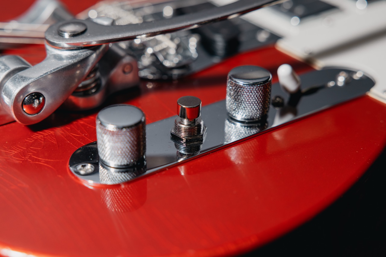 A photo detail of the Fender Stories Collection Mike Campbell “Red Dog” Telecaster