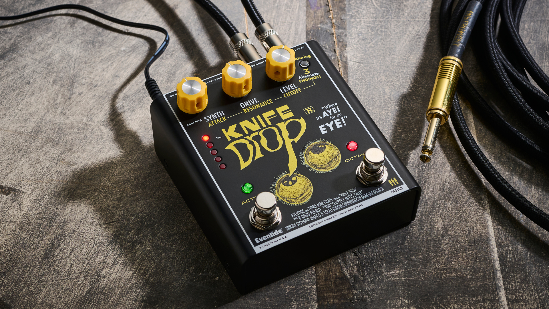 The Eventide x Third Man Hardware Knife Drop on a wooden floor with a guitar cable next to it