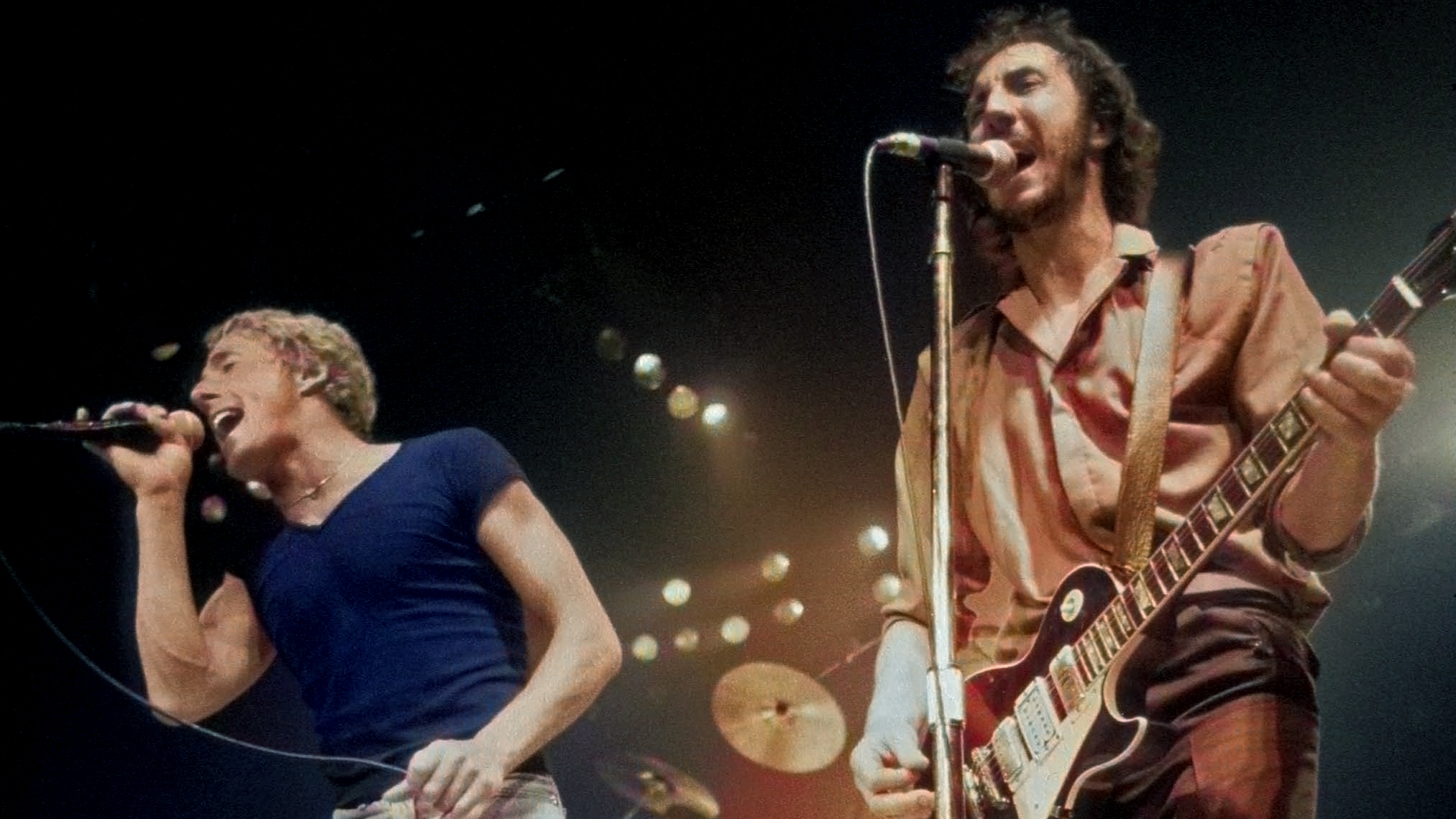 Roger Daltrey and Pete Townshend of The Who perform on stage, USA, September 1979. Townshend plays his Gibson Les Paul Deluxe guitar number 1.