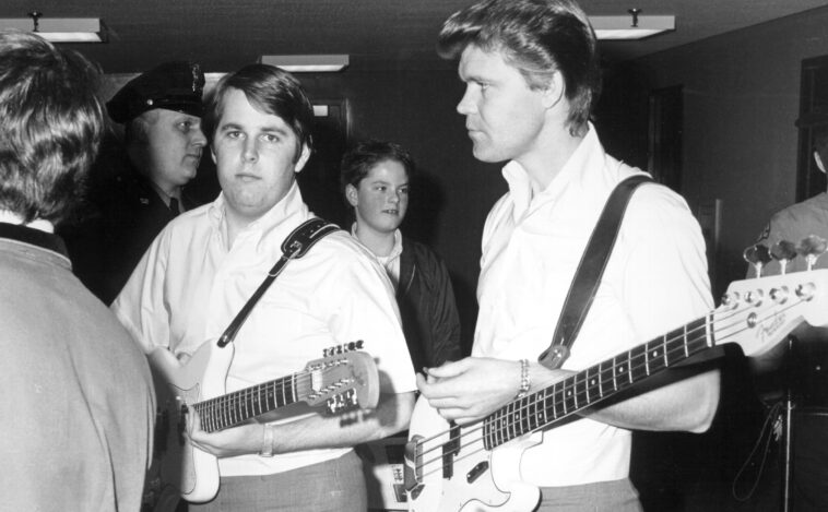 Singer Glen Campbell and guitarist Carl Wilson of the rock and roll band