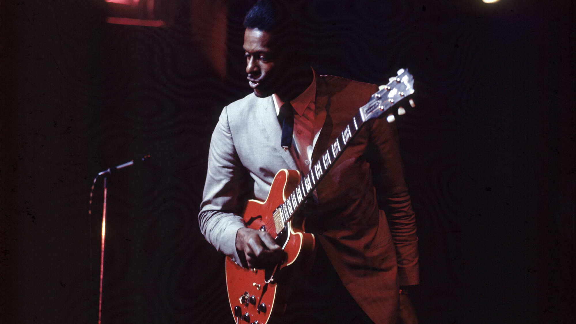American singer, songwriter and guitarist Chuck Berry (1926-2017) performs live on stage at The Astoria in Finsbury Park, London on 9th May 1966. He's playing a Gibson ES-345 model electric guitar.