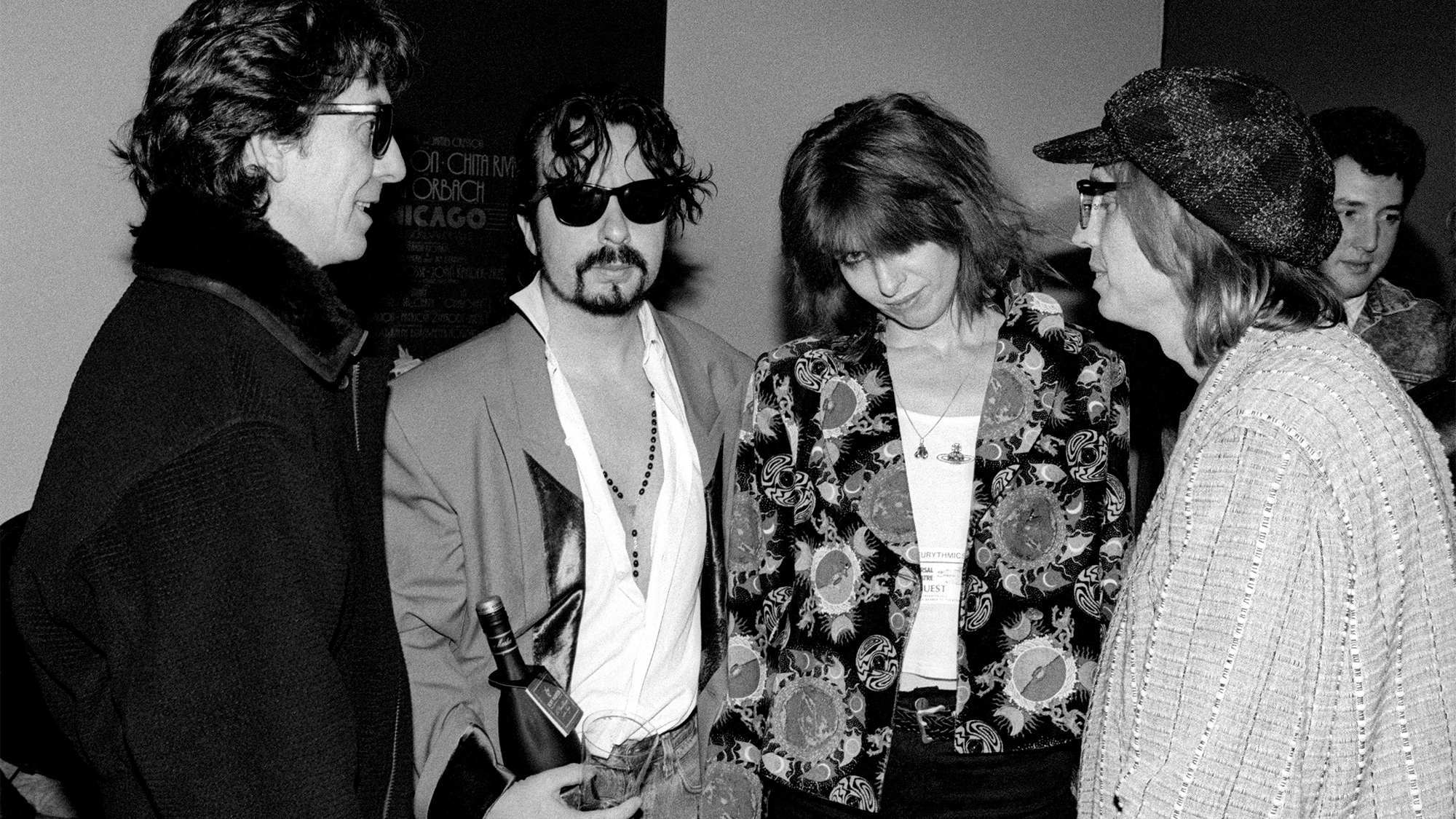 (from left) George Harrison, Dave Stewart, Chrissie Hynde, and Tom Petty back stage circa 1990 in Los Angeles, California.