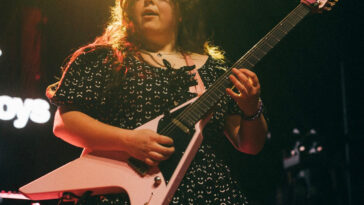Maddie Caffrey performs onstage with the Callous Daoboys