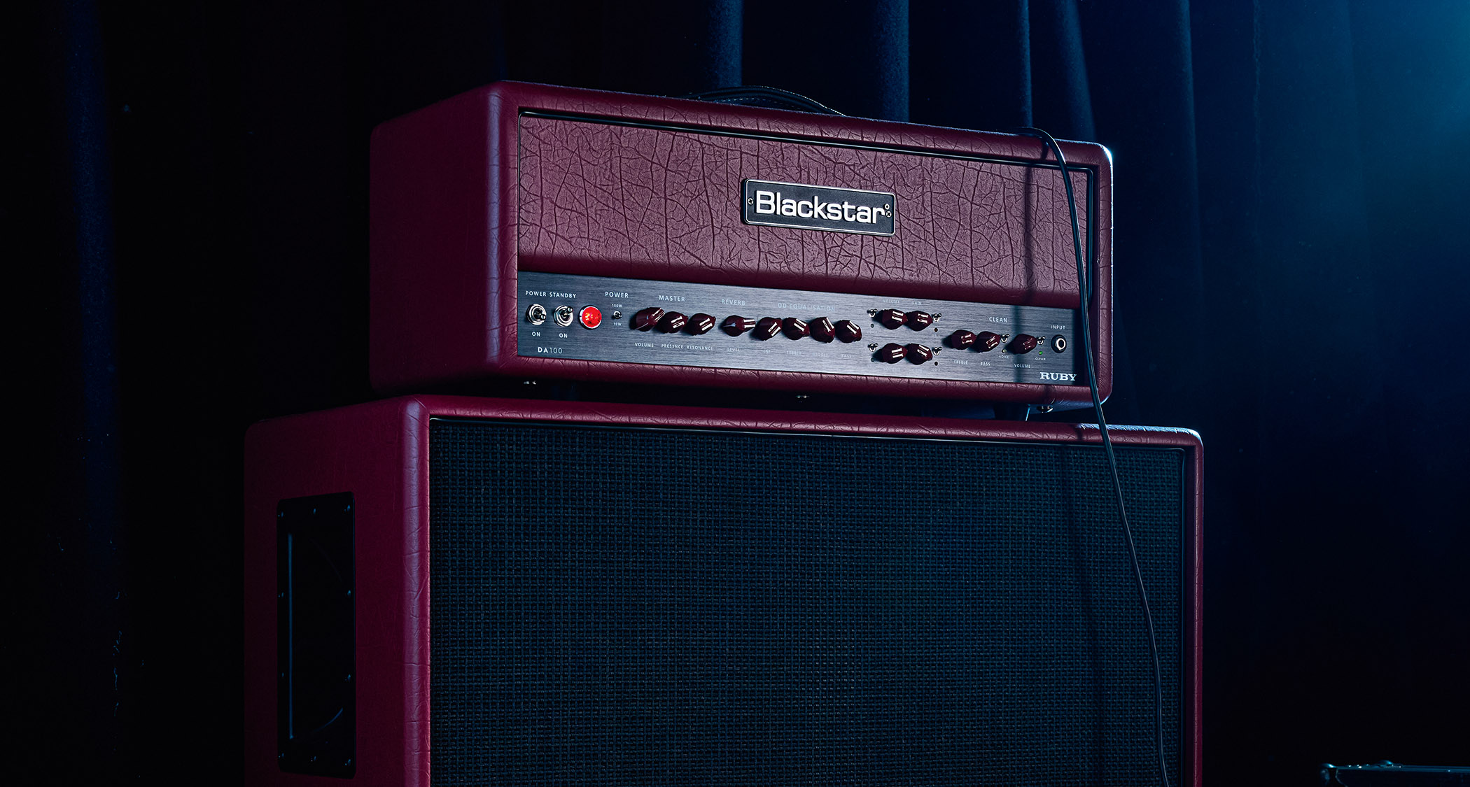 Doug Aldrich's signature amp, the Blackstar DA100, is photographed in moody low-light situations.
