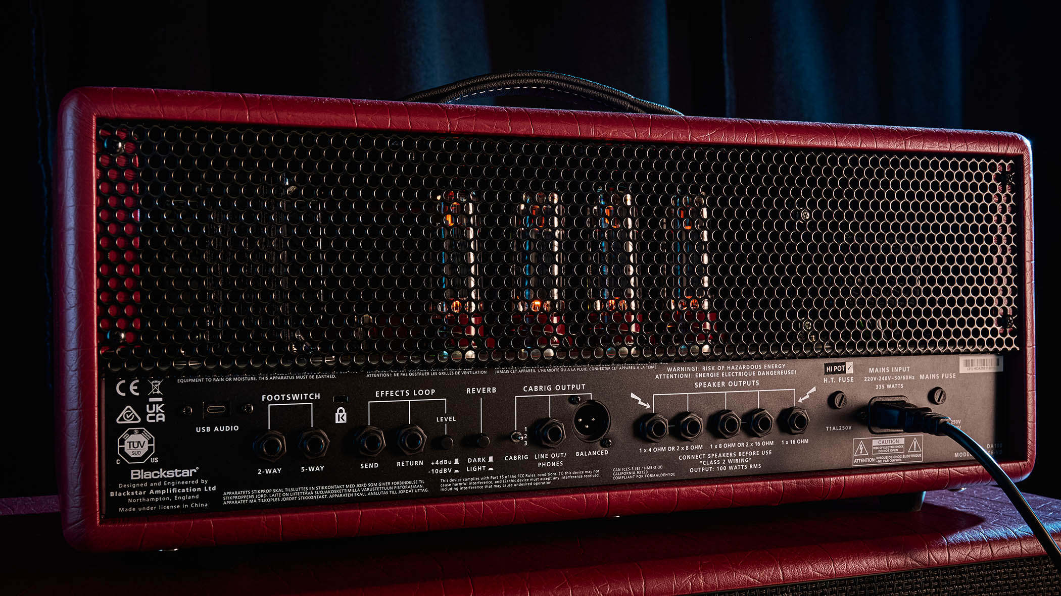 Doug Aldrich's signature amp, the Blackstar DA100, is photographed in moody low-light situations.