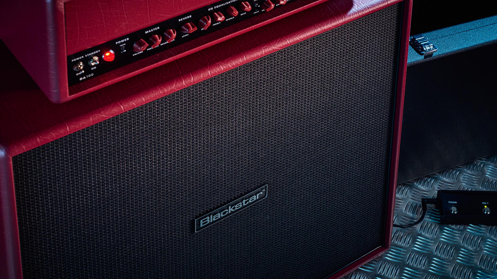 Doug Aldrich's signature amp, the Blackstar DA100, is photographed in moody low-light situations.