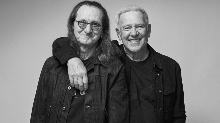 "After deep reflection, Alex and I have concluded that we truly miss it": Alex Lifeson and Geddy Lee unveil Rush reunion tour and announce the drummer's identity.]