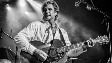 "Henry Paul of The Outlaws Reflects on Touring with a Sober Stevie Ray Vaughan, His Unique Playing Style, Opening for The Rolling Stones, and Gaining Fame Through Lynyrd Skynyrd with His One-of-a-Kind Red Gretsch Falcon"]