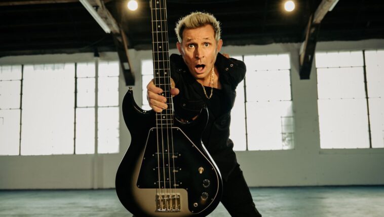 Mike Dirnt discusses his iconic Grabber bass and the future of Green Day.]