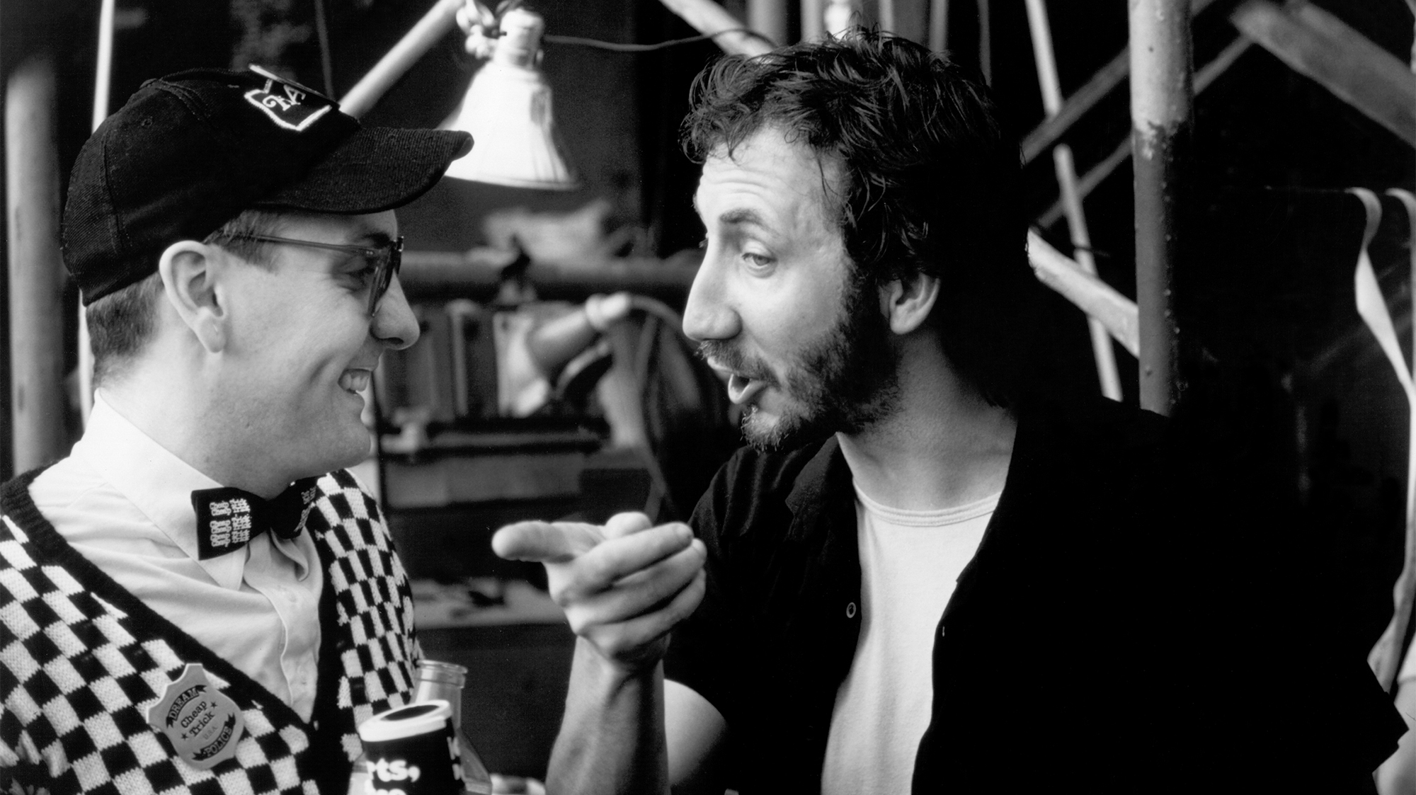 CIRCA 1980: Guitarists Rick Nielsen of the rock and roll band "Cheap Trick" and Pete Townshend of the rock and roll band "The Who" have a meeting of the minds in circa 1980.