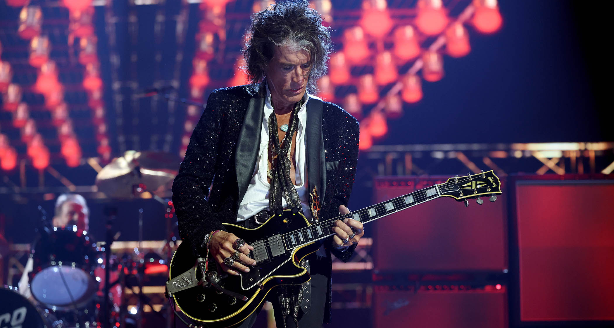 Joe Perry plays a black Les Paul Custom at the Rock And Roll Hall Of Fame Awards 2025.