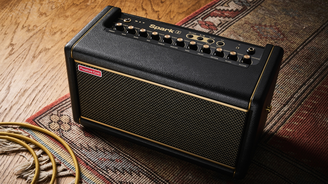 A Positive Grid Spark 2 practice amp on a rug