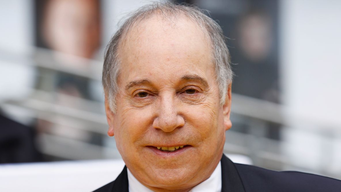 "Celebrated for his storytelling in music, Paul Simon has influenced contemporary music for over sixty years and will receive a Lifetime Achievement award at the 2026 Grammys."]