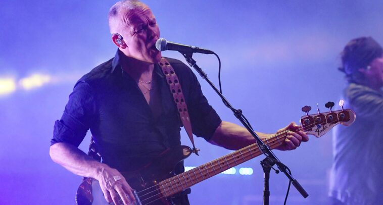 Charlie Jones was unaware of his Grammy victory.]