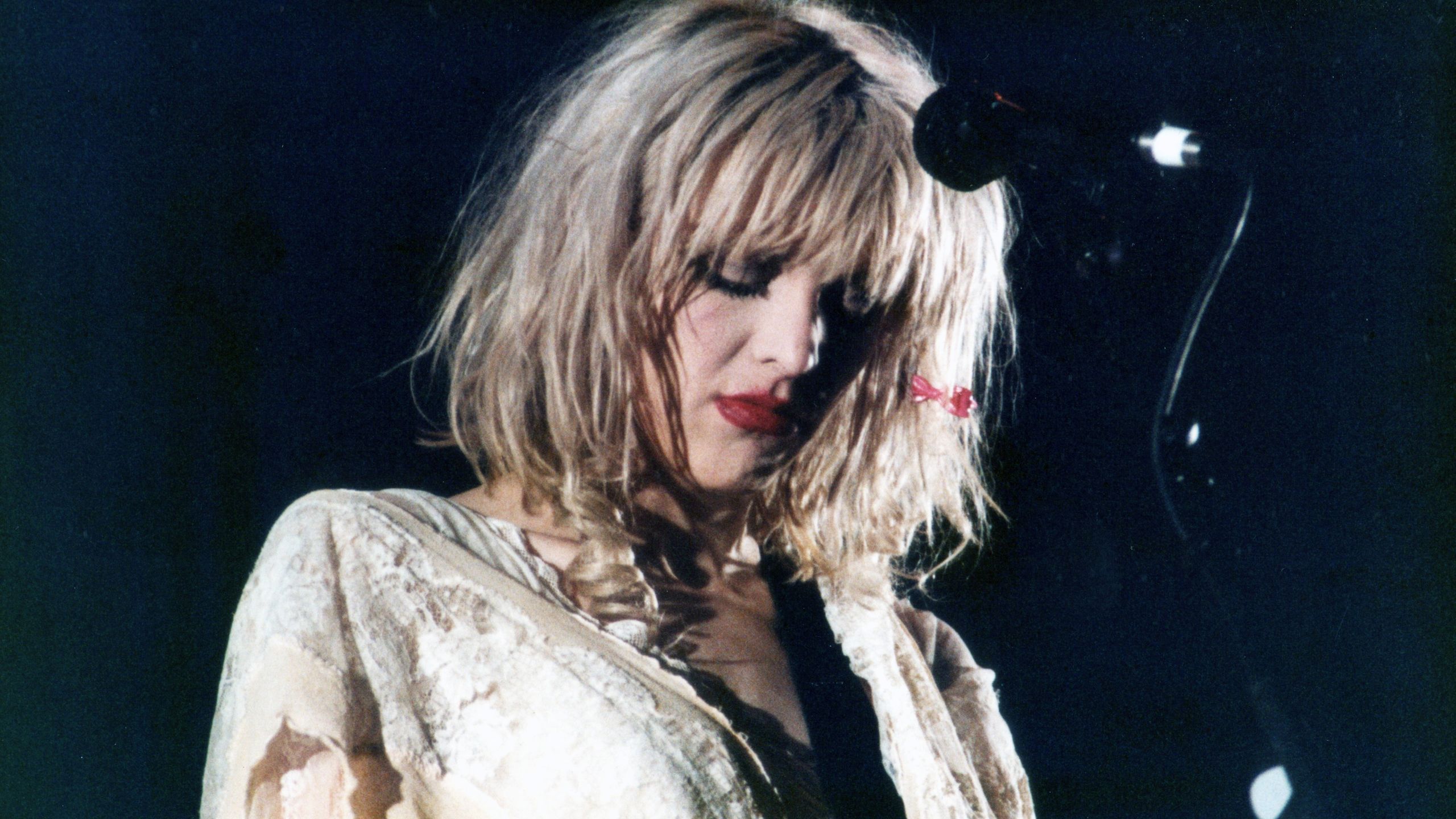 "Claiming My Place as the First Owner of a Super Fuzz Big Muff: How Courtney Love Crafted the Grunge Classic Amidst Her Toughest Times"]
