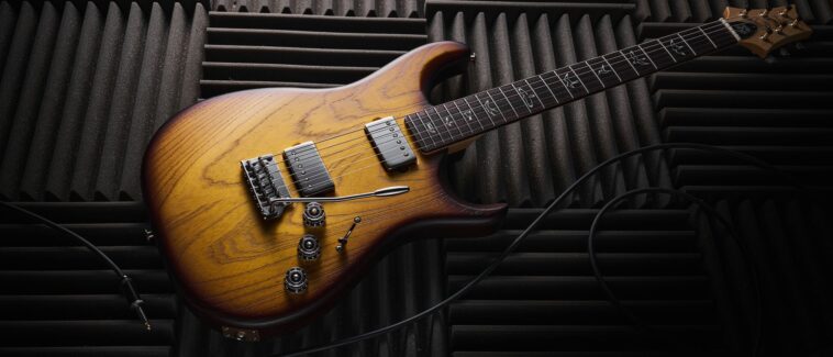 “Discover the sophisticated tones without the hassle of single coil hum... an almost ideal functional gig guitar: PRS Fiore HH Satin Review”]