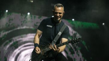 "Mark Tremonti of Alter Bridge Shares Insights on the Most Powerful Guitar Solo Ever and How Alternate Tunings Enhance His Playing"]