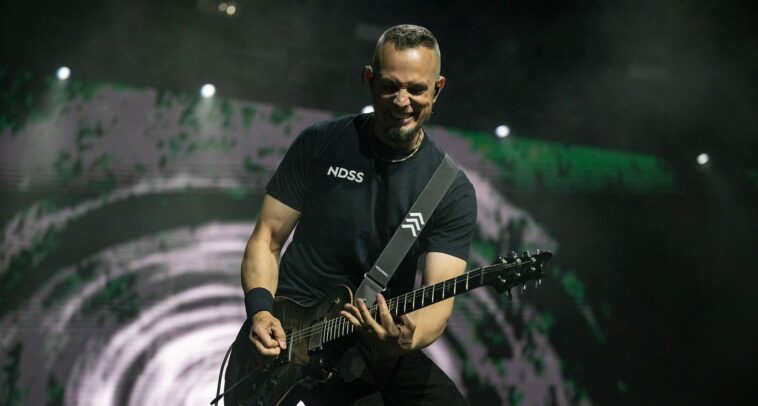 "Mark Tremonti of Alter Bridge Shares Insights on the Most Powerful Guitar Solo Ever and How Alternate Tunings Enhance His Playing"]