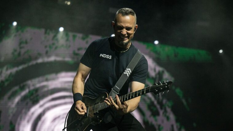 "Mark Tremonti of Alter Bridge Shares Insights on the Most Powerful Guitar Solo Ever and How Alternate Tunings Enhance His Playing"]
