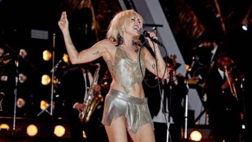 “Miley Cyrus discusses her significant vocal cord polyp, highlighting how it contributes to her unique tone and texture, yet makes performing challenging and impacts her ability to tour.”]