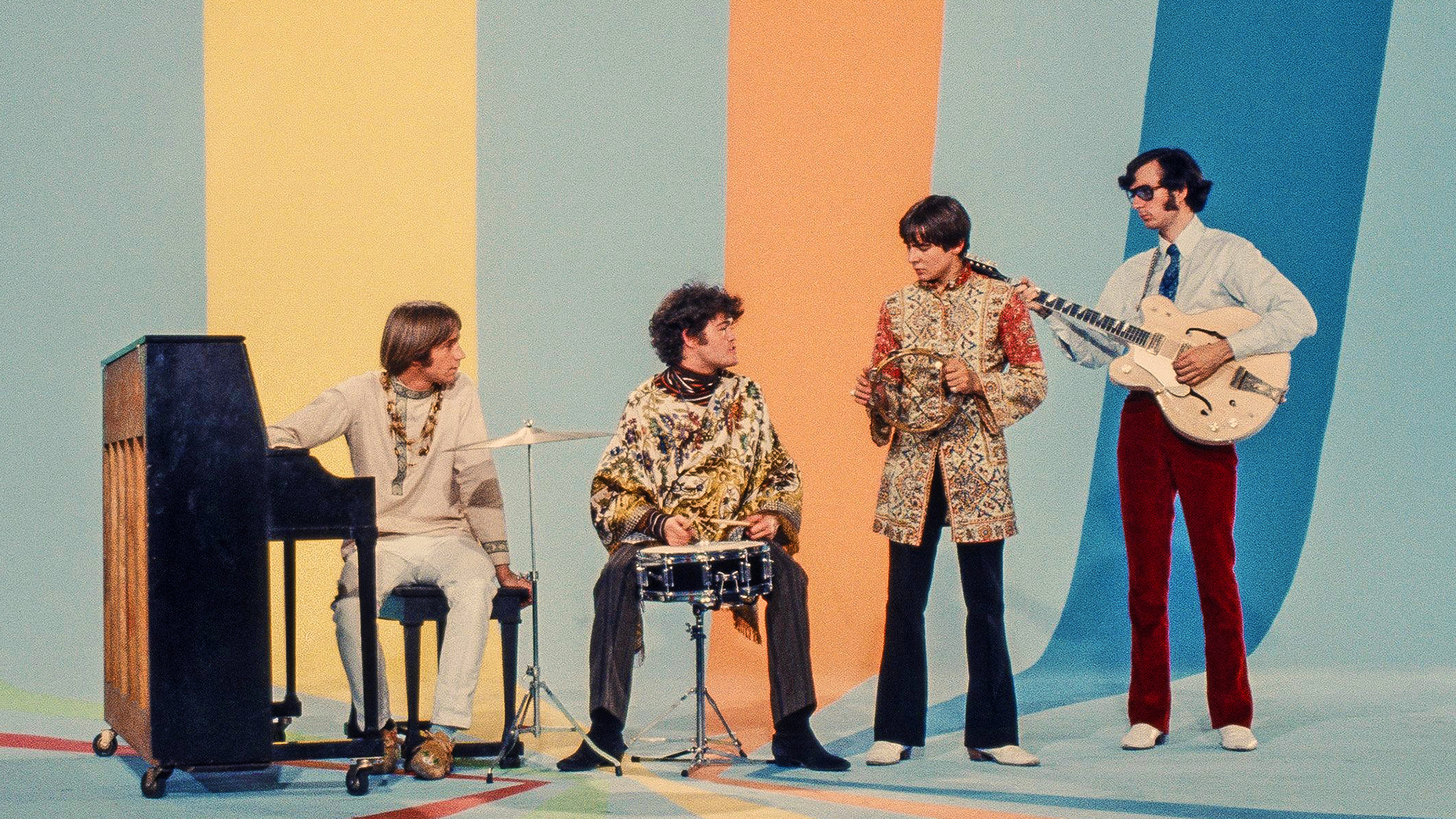 (from left) Peter Tork, Micky Dolenz, Davy Jones and Mike Nesmith on the set of the television show The Monkees in August 1967 in Los Angeles, California.
