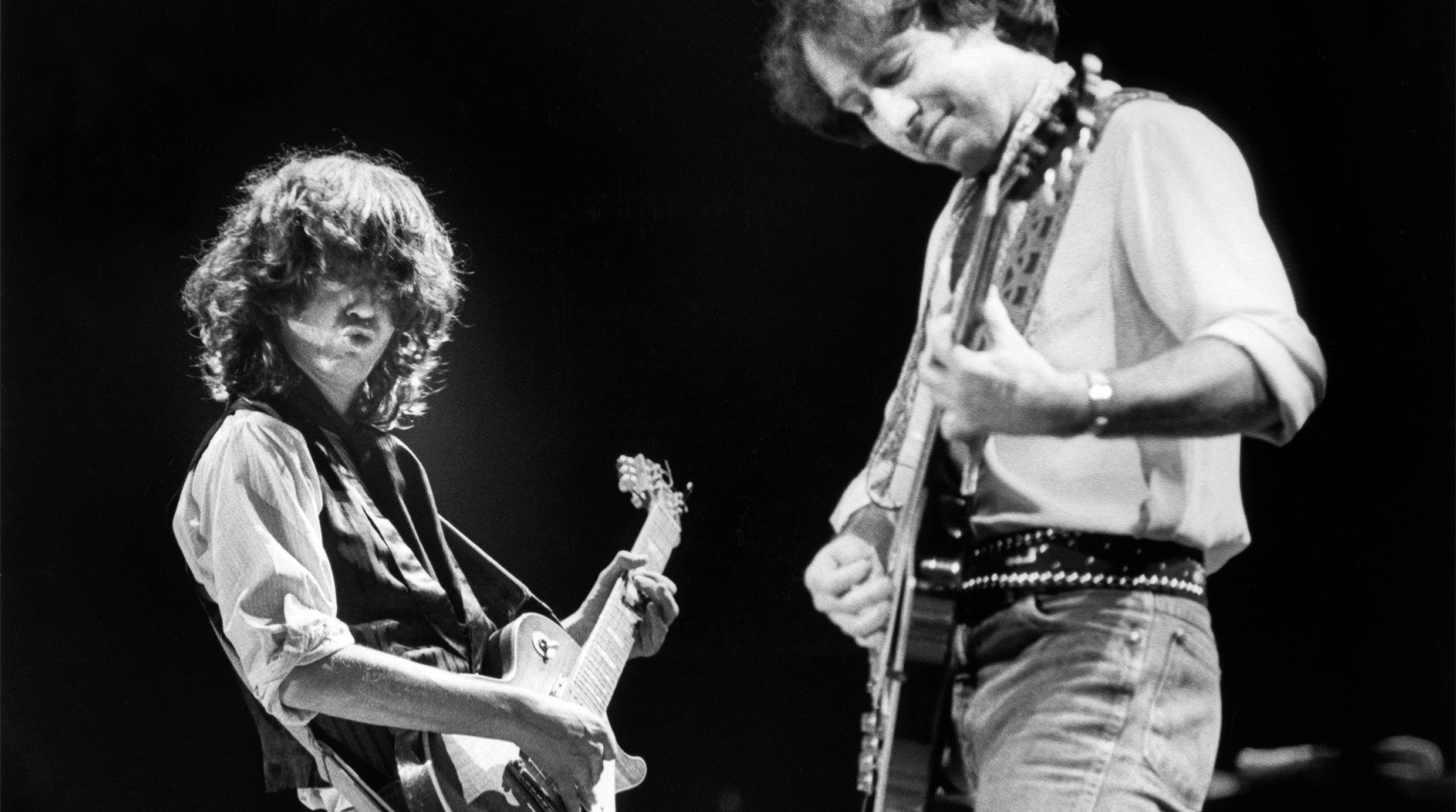 Photo of FIRM and Paul RODGERS and Jimmy PAGE; Jimmy Page and Paul Rodgers (R) performing on stage