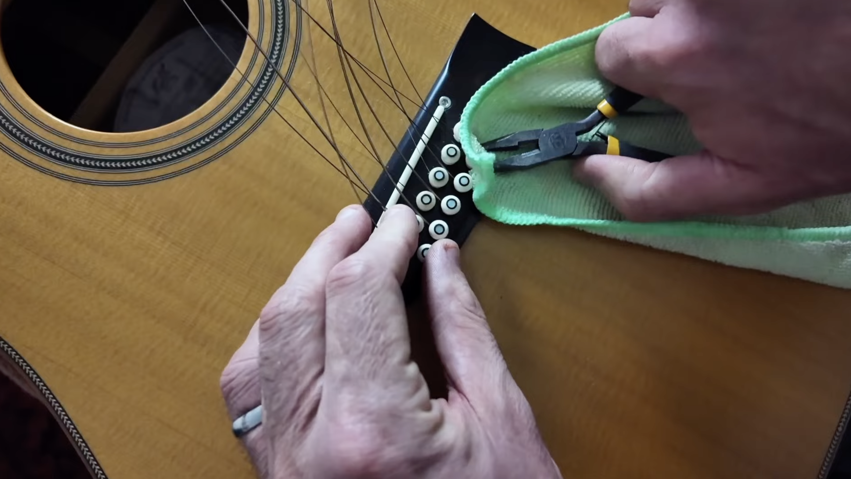 12 string guitar bridge pin removal