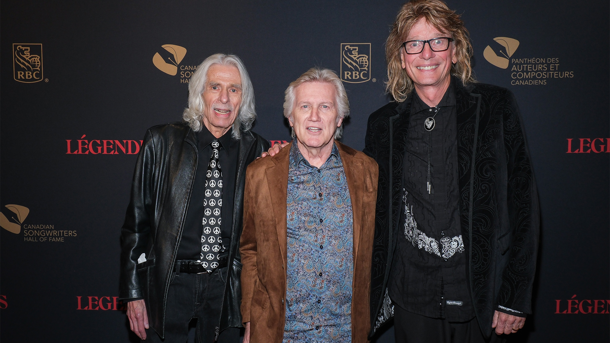 L-R) Mike Levine, Rik Emmett, and Gil Moore of Triumph attend the 2025 Canadian Songwriters Hall Of Fame Legends Induction at Meridian Arts Centre on October 17, 2025 in Toronto, Ontario.