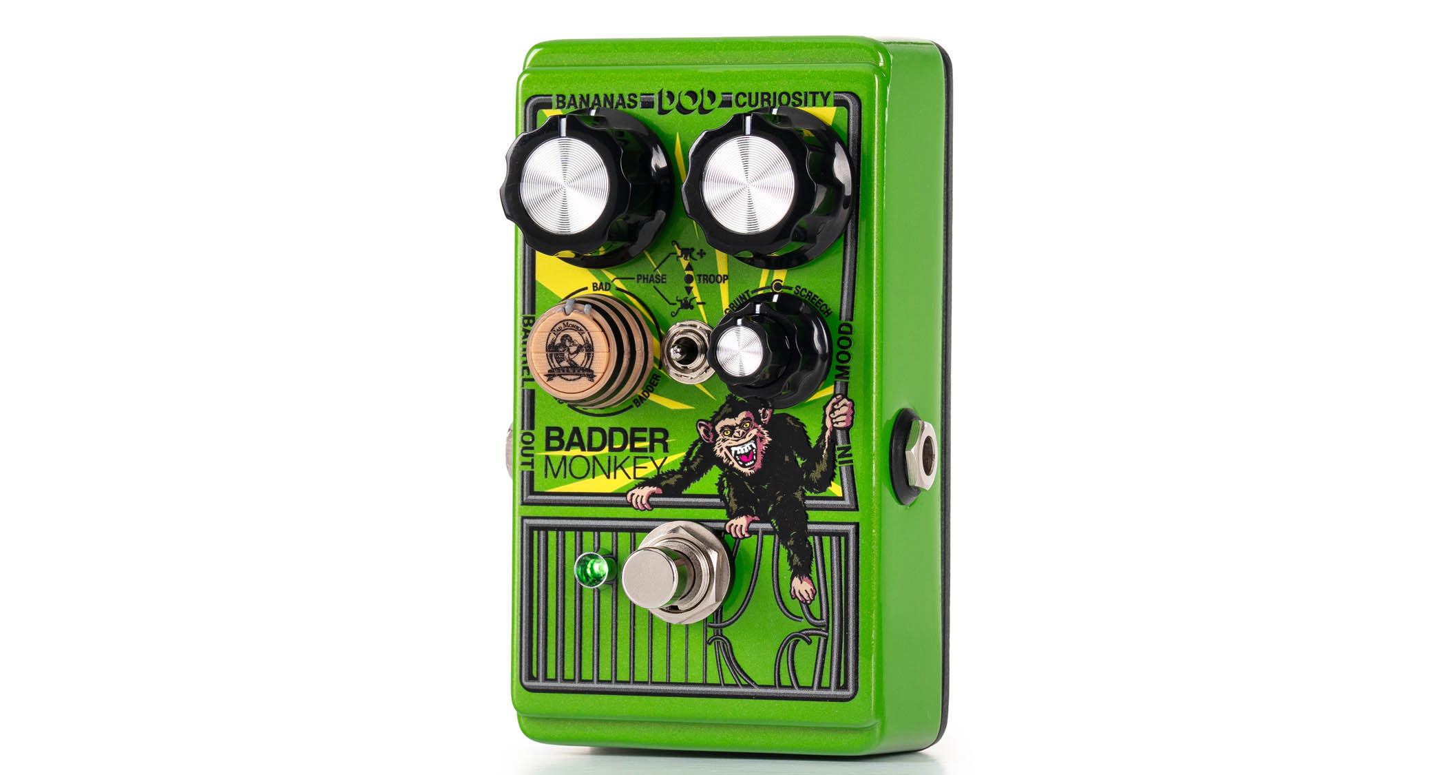 The DOD Badder Monkey is a redux take on the DigiTech Bad Monkey overdrive, but it adds two all-new circuits, plus a wooden barrel knob for blending them. It is painted green and has an illustration of a chimpanzee on the front.