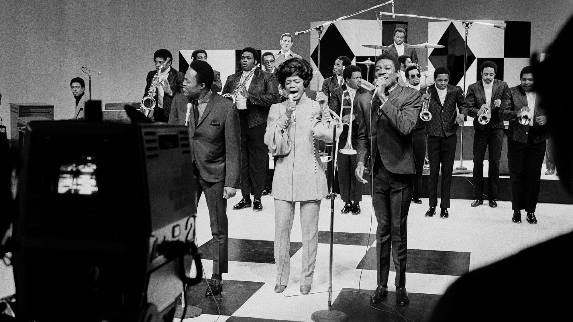 American soul singer Carla Thomas performs with duo Sam &amp; Dave at the Stax Records 'Gettin' It All Together' television special in New York City, 20th March 1969. In the background are Booker T Jones and Steve Cropper of Booker T &amp; the MG's. Stax are celebrating the release of 27 LPs and 30 singles.