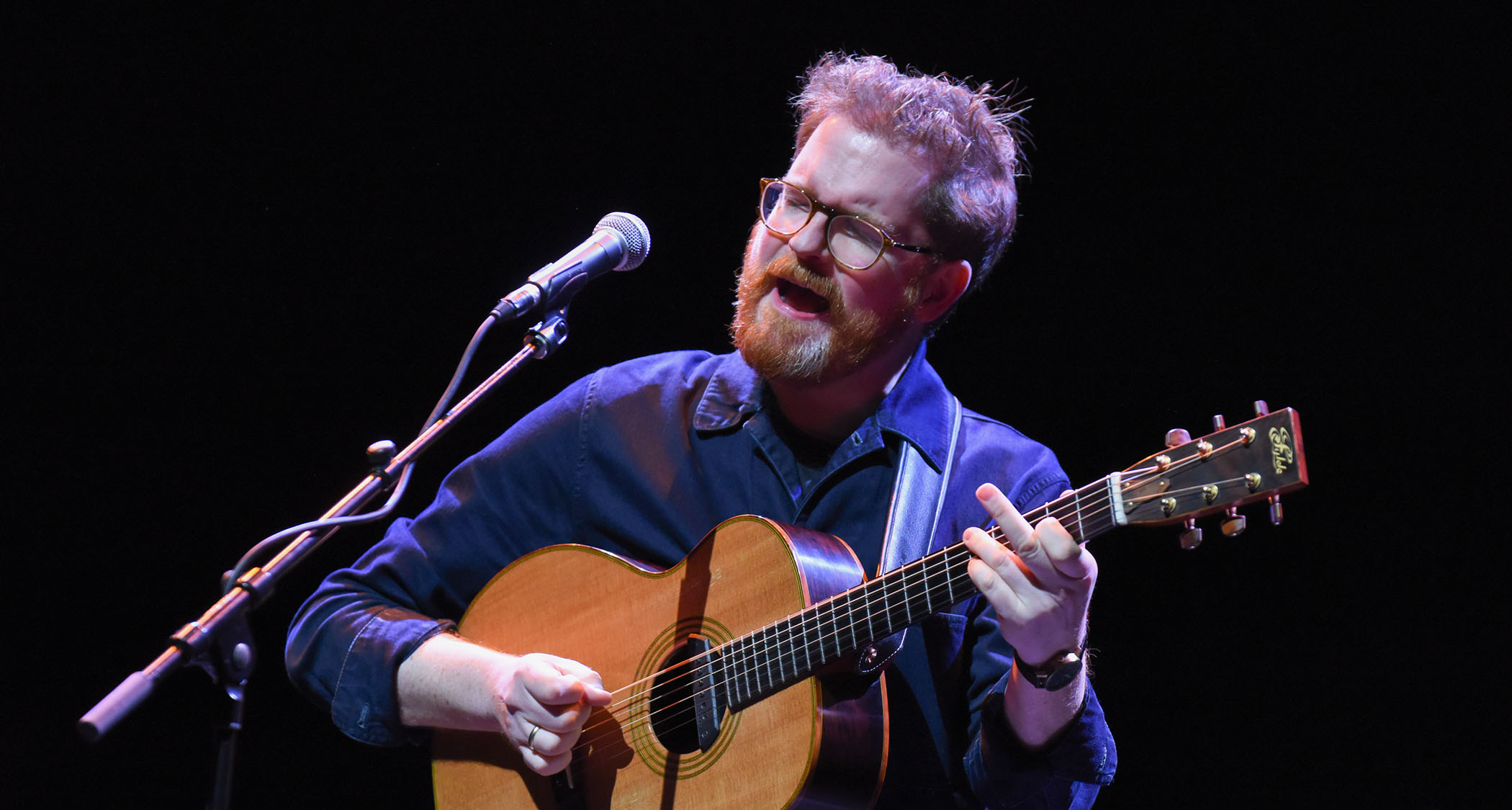 John Smith performs at the Barbican, London, with a Fylde acoustic guitar
