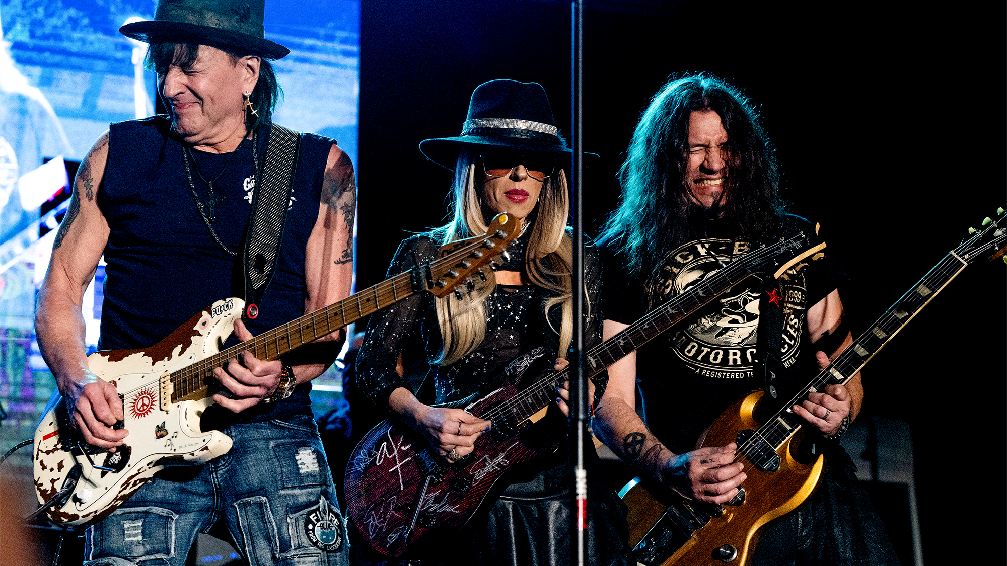 (from left) Richie Sambora of Bon Jovi, Orianthi and Phil X of Bon Jovi perform onstage with Kings of Chaos during the Rock for Responders Benefit Concert at Battleship USS Iowa Museum on February 27, 2025 in San Pedro, California.