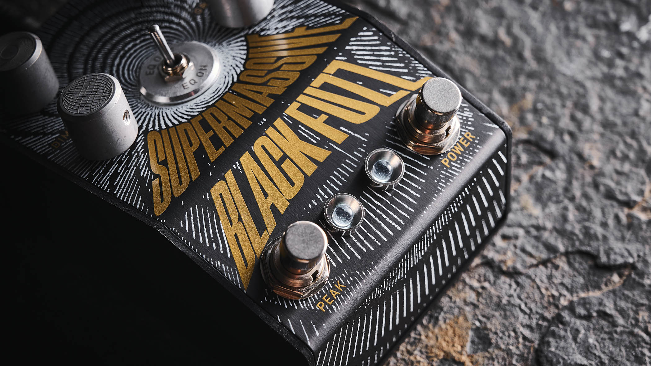 The Manson Guitar Works Supermassive Black Fuzz has control knobs crafted from exceedingly strong 6082 T6 aluminium and each is engraved with unique custom art to&nbsp;represent its function