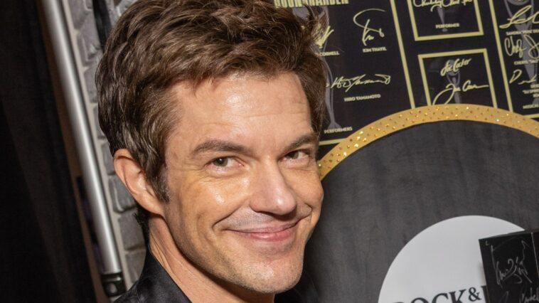 "Brandon Flowers discusses focusing on solo projects this year, reflecting on the challenges of quickly creating an album on the road despite increased computer use."]