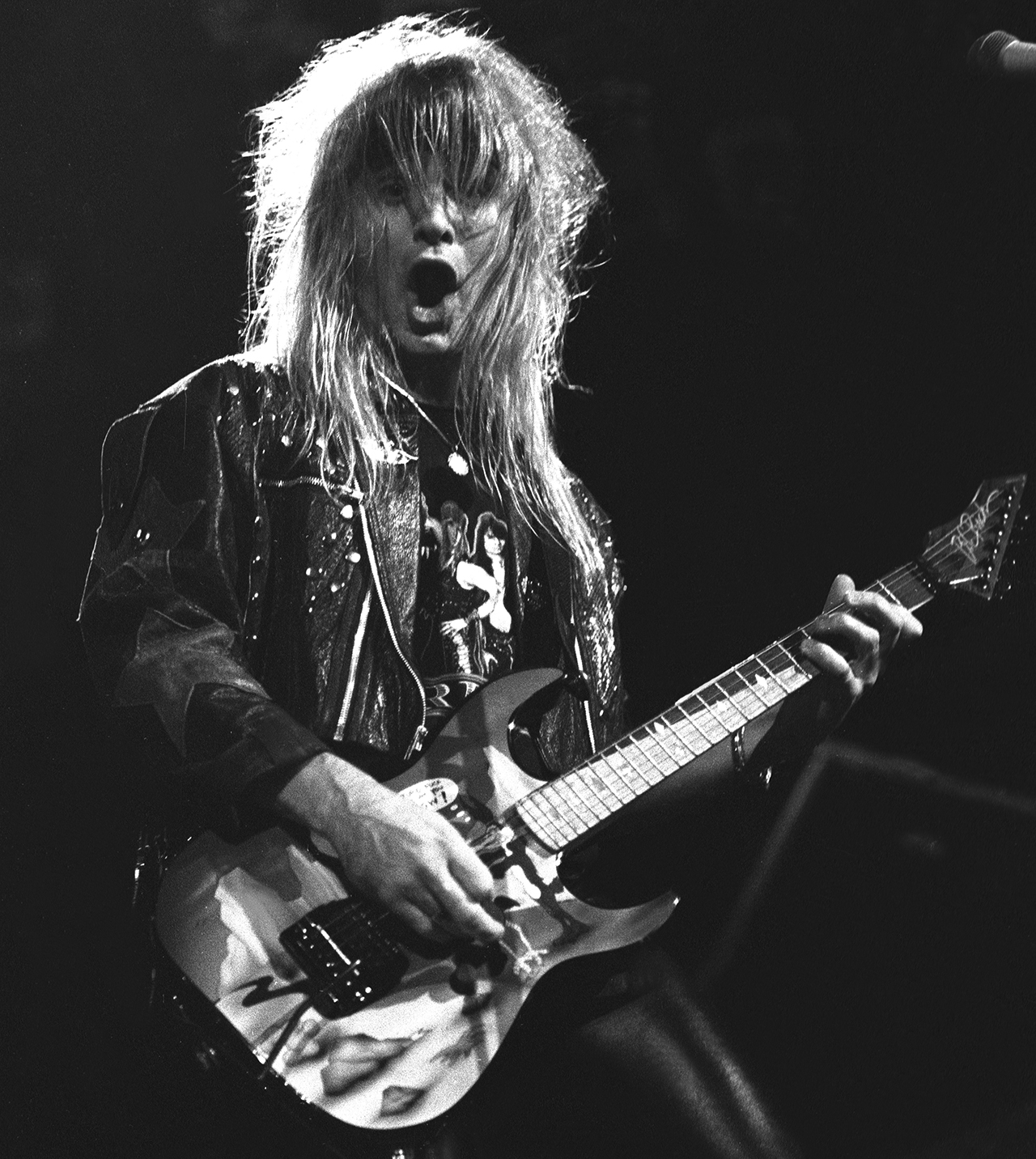 Guitarist Joey Allen of the hard rock band Warrant is shown performing on stage during a "live" concert appearance on December 8, 1989. (Photo by John Atashian/Getty Images)