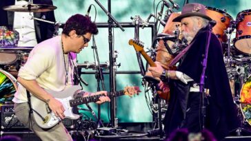 John Mayer honors Bob Weir during a public memorial service.]
