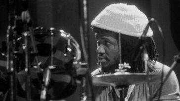 “Legendary figure… one of the finest drummers in history”: Reggae, rock, soul, and funk communities grieve the loss of Sly Dunbar.]