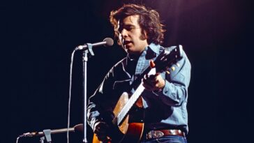 "Navigating Battles for Song Releases: How a 1970s Rock Icon Achieved His Second Major Hit and Why It Still Feels Like a Burden After 50 Years"]